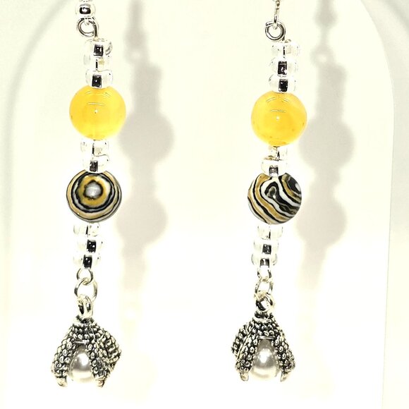 Yellow bead with swirls and dragon claw charm with faux pearl, Dangle Earrings - Picture 1 of 7